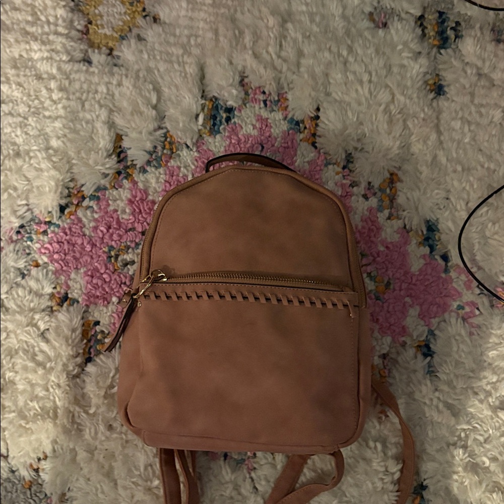 Light pink mini suede backpack tan cheetah print inside